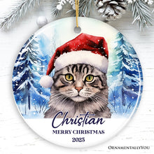 Load image into Gallery viewer, Tabby Cat with Santa Hat Personalized Ornament, Winter Forest Christmas Gift With Custom Name and Date
