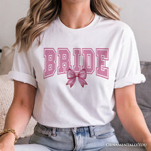 Carregar imagem no visualizador da galeria, Coquette Bride T-Shirt, Pink Bow White Tee for Stylish Brides
