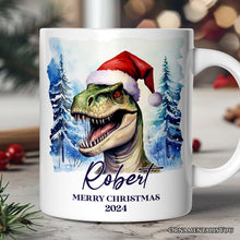 Load image into Gallery viewer, Dinosaur with Santa Hat Personalized Mug, Winter Forest Christmas Gift With Custom Name and Date

