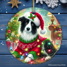 Carregar imagem no visualizador da galeria, Playful Border Collie with Santa Hat Ornament, Festive Canine Christmas Decor
