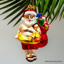 Carregar imagem no visualizador da galeria, Santa on Summer Vacation in the Pool Quirky Glass Christmas Ornament, Rubber Duckey Tropical Holiday Decor
