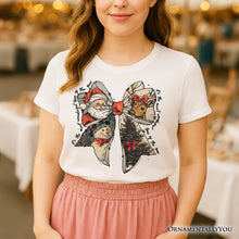 Load image into Gallery viewer, Coquette Christmas Bow T‑Shirt, It&#39;s Most Wonderful Time Of The Year Vintage Tee With Santa, Deer and Snowman
