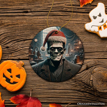 Carregar imagem no visualizador da galeria, Grotesque Frankenstein with Santa Hat Ornament, Spooky Holiday Gift for Horror Fans
