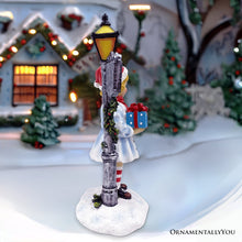 Load image into Gallery viewer, Victorian Style Christmas Girl and Street Lamp Tabletop Figurine, 8&quot; Vintage Holiday Statue of a Gift Carrying Belle
