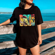 Carregar imagem no visualizador da galeria, Frankenstein&#39;s Beach Vacation T-Shirt, Retro Neon Surf Style Tee for Horror Fans with Summer Vibes
