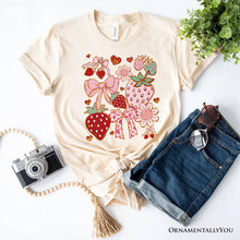 Carregar imagem no visualizador da galeria, Boho Strawberry Coquette T-Shirt, Cute Bow and Floral White and Natural Tee for Sweet and Stylish Women
