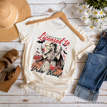Load image into Gallery viewer, Licensed to Draw Blood Halloween Nurse T-Shirt, Groovy Tee for Spooky Season
