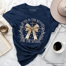 Carregar imagem no visualizador da galeria, Jesus Is the Reason Christmas T‑Shirt, Coquette Gold Bow Cross Tee for Faithful Women
