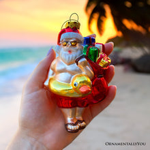 Carregar imagem no visualizador da galeria, Santa on Summer Vacation in the Pool Quirky Glass Christmas Ornament, Rubber Duckey Tropical Holiday Decor
