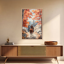 Load image into Gallery viewer, Cowboy riding through autumn forest, Framed Canvas Print, fall landscape wall art, western style decor for cozy homes, perfect gift idea
