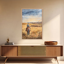 Load image into Gallery viewer, Cowboy leading cattle across golden prairie, Framed Canvas Print, western landscape wall art for rustic farmhouse decor, gift idea holiday
