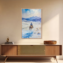 Load image into Gallery viewer, Cowboy riding through snowy mountain pass, Framed Canvas Print, western winter landscape wall art, farmhouse holiday decor Christmas gift
