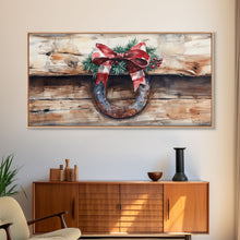 Cargar imagen en el visor de la galería, Festive horseshoe Christmas art, rustic holiday decor, farmhouse holiday gift idea, cozy winter home decor, framed canvas print

