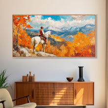 Load image into Gallery viewer, Cowboy on autumn swing, Framed Canvas Print, rustic Western art with vibrant fall, tall framed canvas print autumn decor farmhouse wall art

