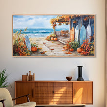 Carregar imagem no visualizador da galeria, Autumn surfboard porch decor scene, Framed Canvas Print with pumpkins and fall leaves on beach, autumn beach house wall art and decor piece
