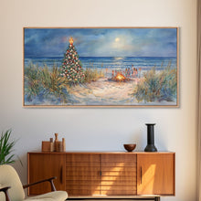 Carregar imagem no visualizador da galeria, Beach Christmas family gathering by the ocean and bonfire, framed canvas print featuring tropical holiday decor wall art
