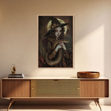 Load image into Gallery viewer, Witch Holding Snake under Full Moon - Dark Forest Sorcery Gothic Art Framed Canvas Print, Halloween Witchy Decor
