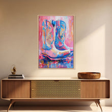 Load image into Gallery viewer, Blue and Pink Cowboy Boots with Floral Background - Framed Canvas Print, Rustic Western Wall Art, Vibrant Boot Art for Home Decor
