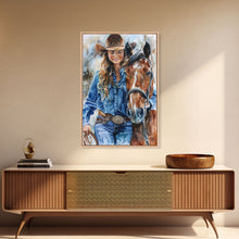 Load image into Gallery viewer, Cowgirl Embracing Horse with Hat - Framed Canvas Print, Western Wall Art, Rustic Decor, Living Room and Bedroom Art Print
