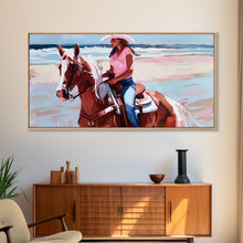 Load image into Gallery viewer, Cowgirl on Horse at the Beach, Stunning Framed Canvas Print, Ideal for Coastal Living Room Art, Beach Bedroom Decor, Equestrian Wall Art
