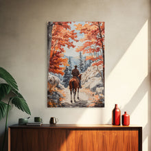 Load image into Gallery viewer, Cowboy riding through autumn forest, Framed Canvas Print, fall landscape wall art, western style decor for cozy homes, perfect gift idea
