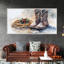 Load image into Gallery viewer, Framed Canvas Print Cowboy Boots and Rope with Pinecones, Rustic Winter Decor, Western Christmas Art, Perfect Holiday Wall Print
