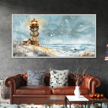 Load image into Gallery viewer, Coastal Christmas Lighthouse Decor Framed Canvas Print, Snowy Beach Scene with Holiday Wreath and Lighthouse Winter Wall Art

