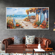 Carregar imagem no visualizador da galeria, Autumn surfboard porch decor scene, Framed Canvas Print with pumpkins and fall leaves on beach, autumn beach house wall art and decor piece
