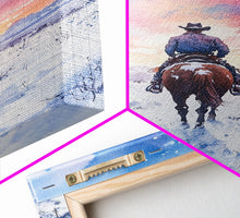 Load image into Gallery viewer, Cowboy riding through snowy sunset, Framed Canvas Print, winter landscape wall art, western decor for above sofa, rustic holiday decor
