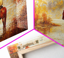 Load image into Gallery viewer, Cowboy sitting by campfire near a lake in the woods with autumn leaves, Framed Canvas Print, moody fall wall art, rustic western home decor
