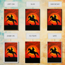 Load image into Gallery viewer, Cowboy on Horse with Dramatic Sunset Background | Framed Canvas Print | Western Silhouette Art | Sunset Cowboy Wall Art for Bedroom

