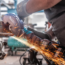 Carregar imagem no visualizador da galeria, Makita GAG14M1 40V max XGT® Brushless Cordless 4‑1/2” / 6" Paddle Switch Angle Grinder Kit, with Electric Brake (4.0Ah)
