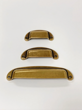 Load image into Gallery viewer, Drawer Cup Pull &quot;Capri&quot; in Antique Brass - Brass Cabinet Hardware
