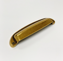 Load image into Gallery viewer, Drawer Cup Pull &quot;Capri&quot; in Antique Brass - Brass Cabinet Hardware
