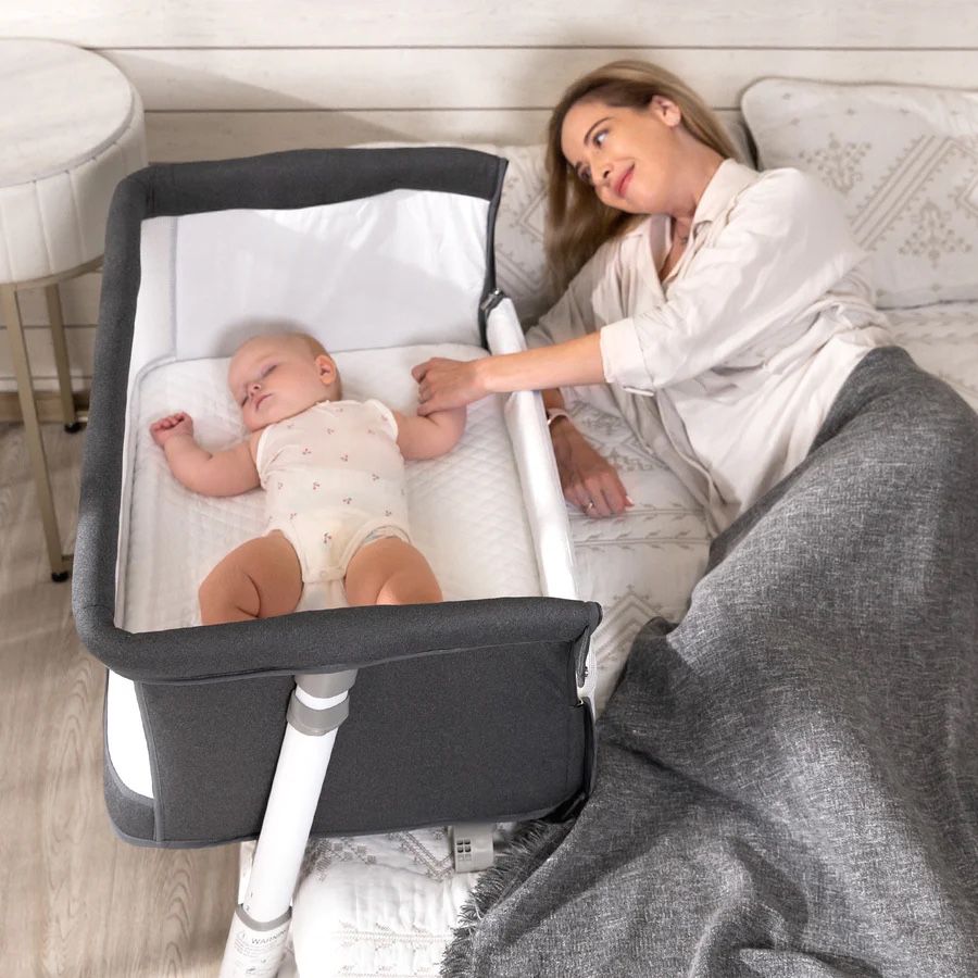 Daming bedside bassinet with wheels