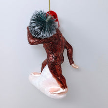 Carregar imagem no visualizador da galeria, Holiday Forest Dweller Bigfoot Glass Christmas Ornament, Yeti and Sasquatch Tree Thief
