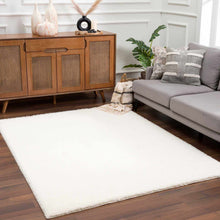 Load image into Gallery viewer, Heavenly Solid Cream Plush Rug
