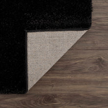 Load image into Gallery viewer, Heavenly Solid Black Plush Rug - Clearance
