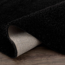 Load image into Gallery viewer, Heavenly Solid Black Plush Rug - Clearance
